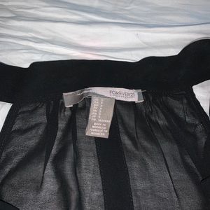 Sheer black top ties around neck